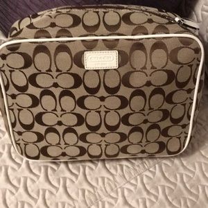 Coach travel toilette case. NWOT!!